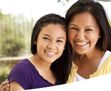 Image of smiling mother and daughter